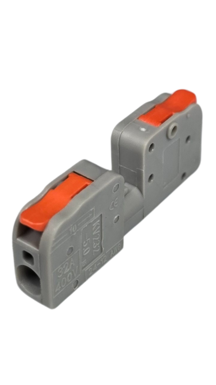 Szybkozłączka elektryczna TAC SPL1_KV232 kompaktowa przelotowa złączka instalacyjna do przewodów jednodrutowych i elastycznych, zapewnia bezpieczne i trwałe połączenia kabli, nowoczesna alternatywa dla tradycyjnych kostek elektrycznych.